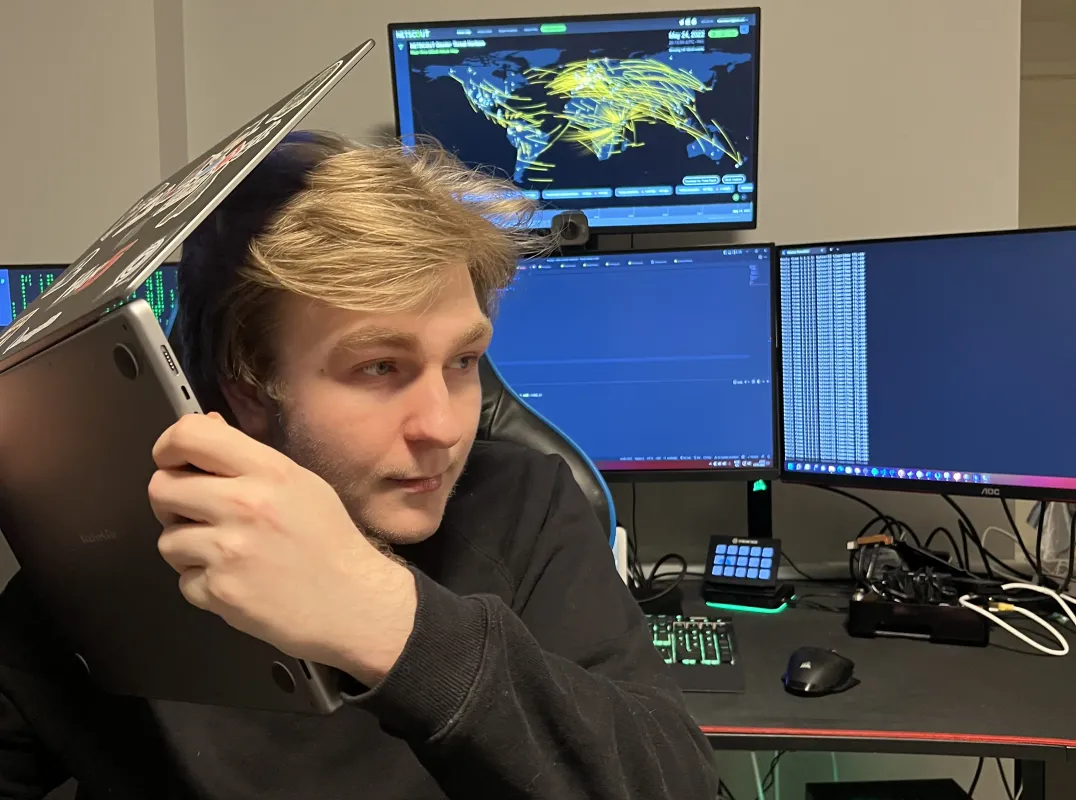 Daniel Christensen sitting infront of the pc